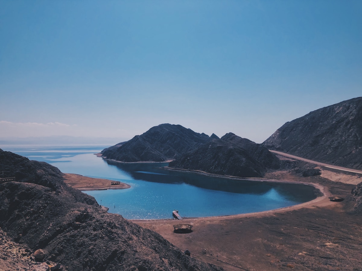 Diver entering the water at the Lighthouse dive site in Dahab, Red Sea