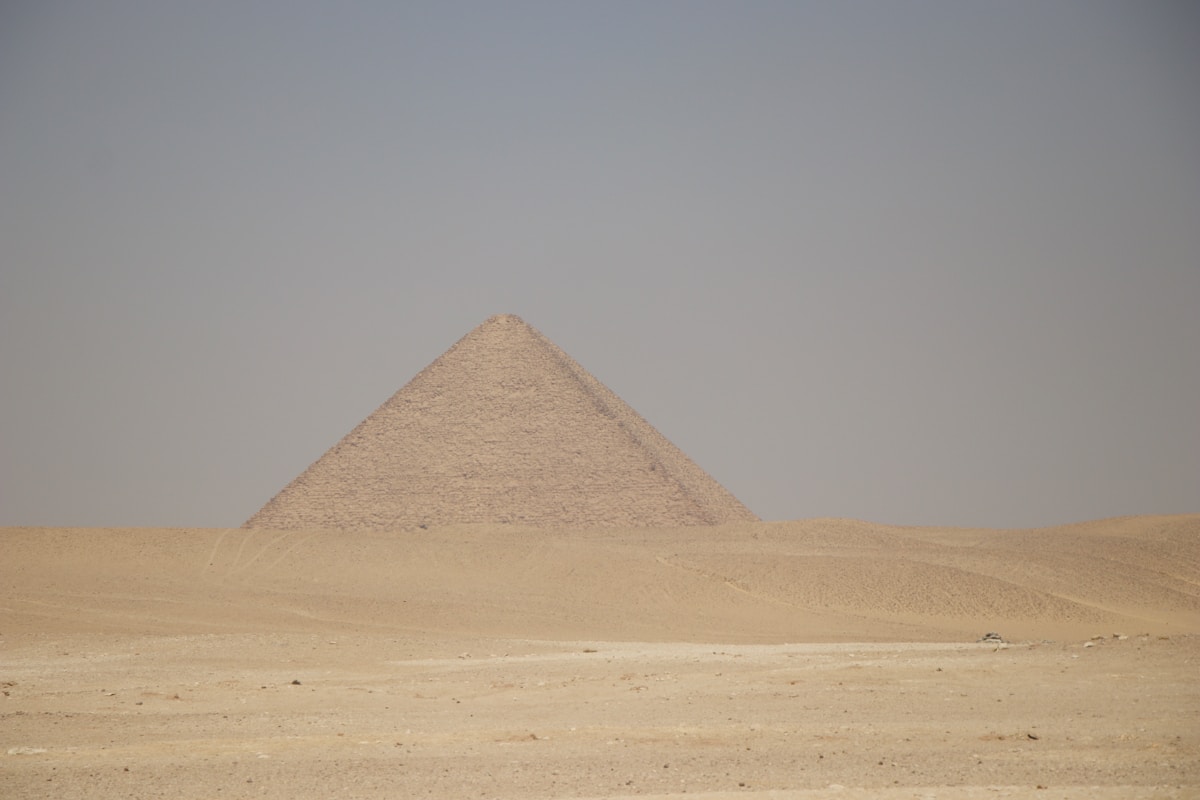The Red Pyramid rising from the desert at Dahshur, Egypt