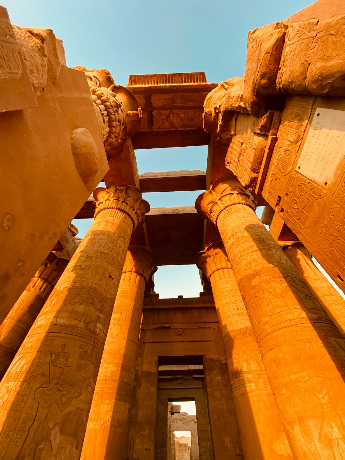 Ornate decorated columns with hieroglyphs at the Temple of Kom Ombo, Egypt