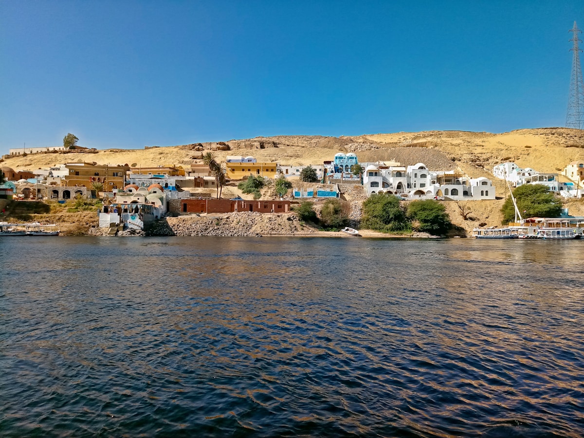 Nubian village with colourful houses on the west bank of the Nile near Aswan, Egypt