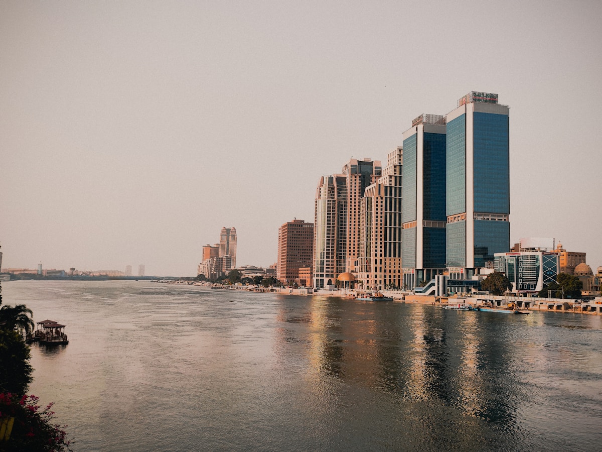 Cairo city skyline reflected in the Nile River, Egypt