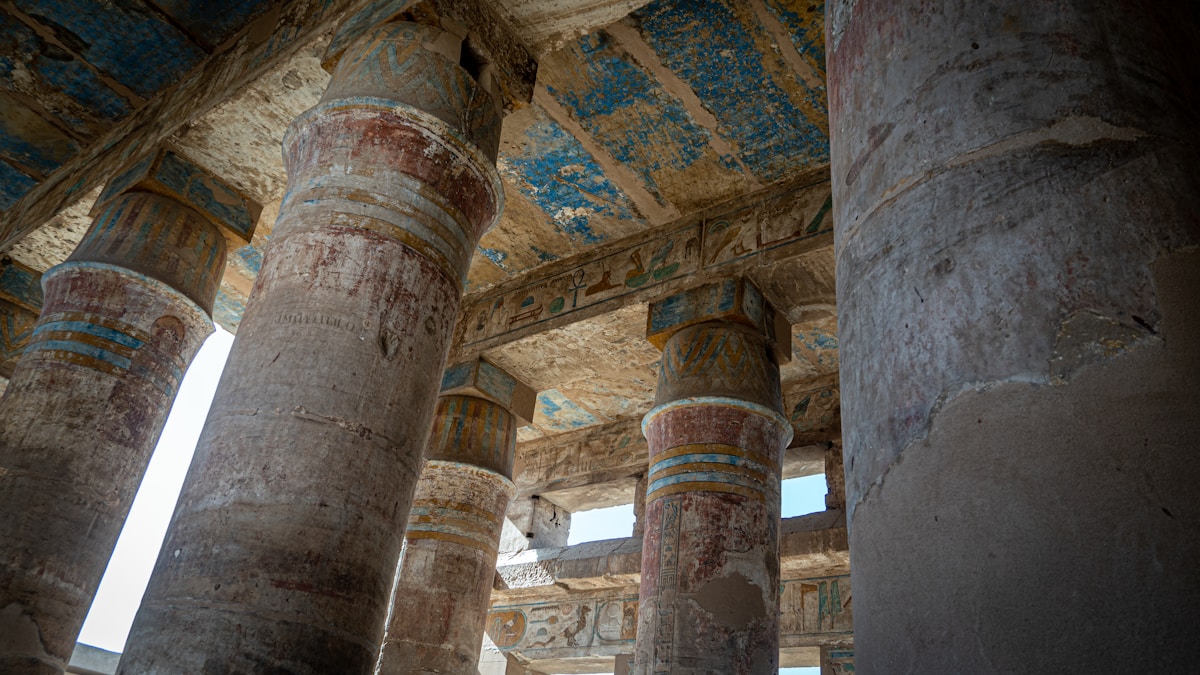 Ancient Egyptian painted columns with hieroglyphs, Luxor temple