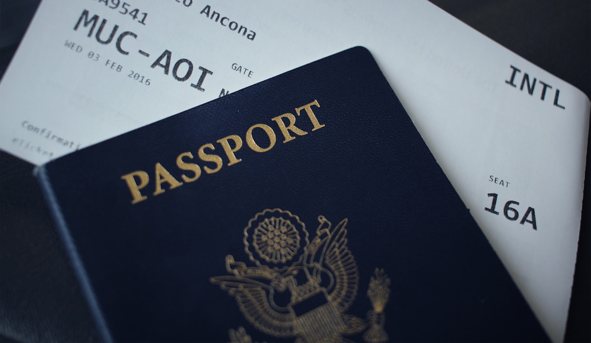 Passport and boarding pass for international travel - travel insurance documentation for Egypt